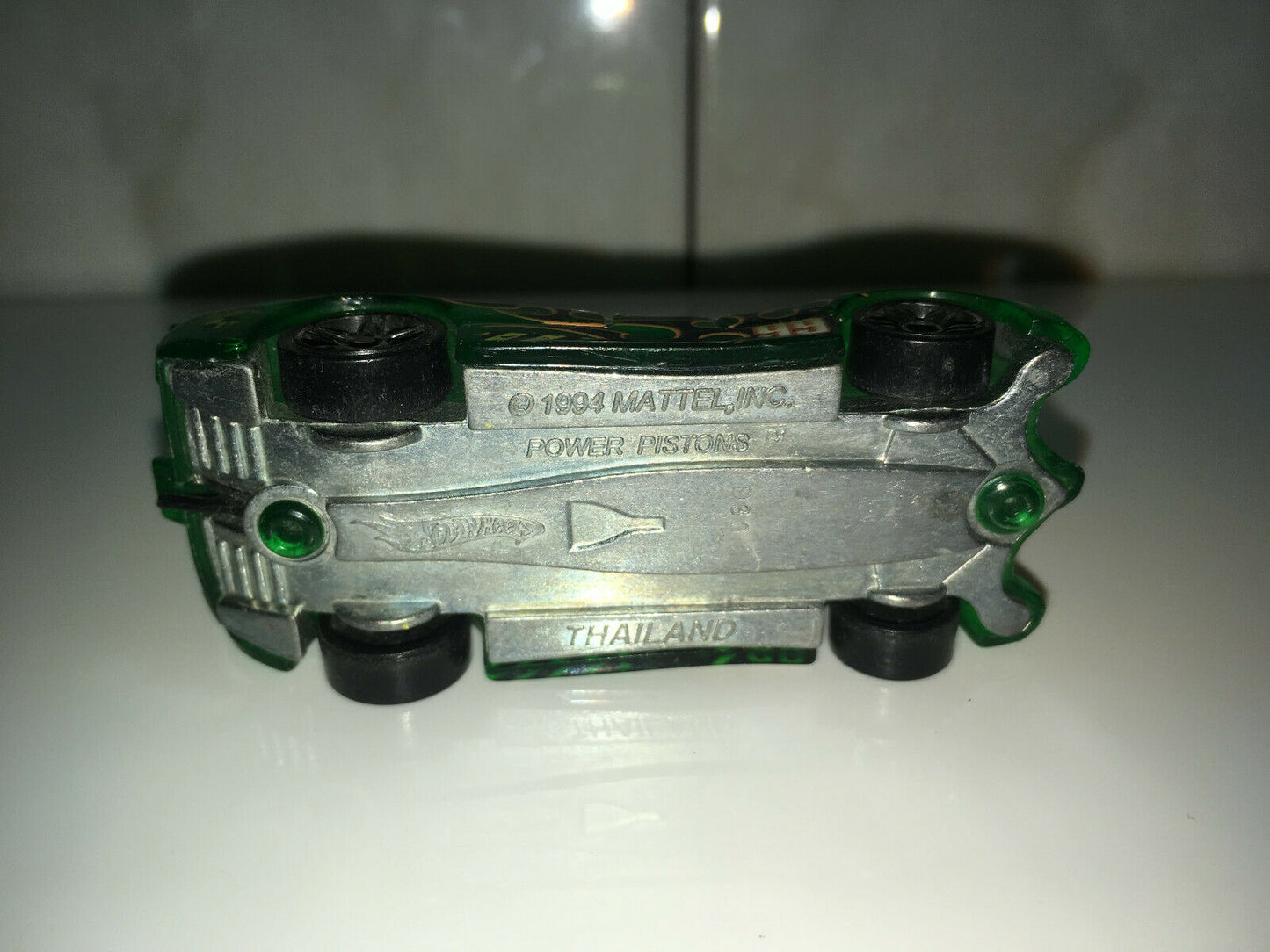 1994 Hot Wheels Power Pistons No.99 Green and Orange Loose