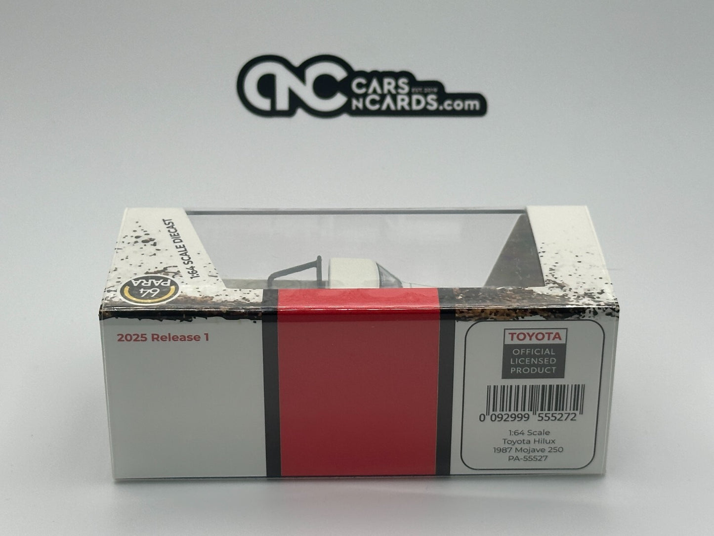 PARA64 1:64 Toyota Hilux Single Cab 1987 Mojave 250 PA-55527