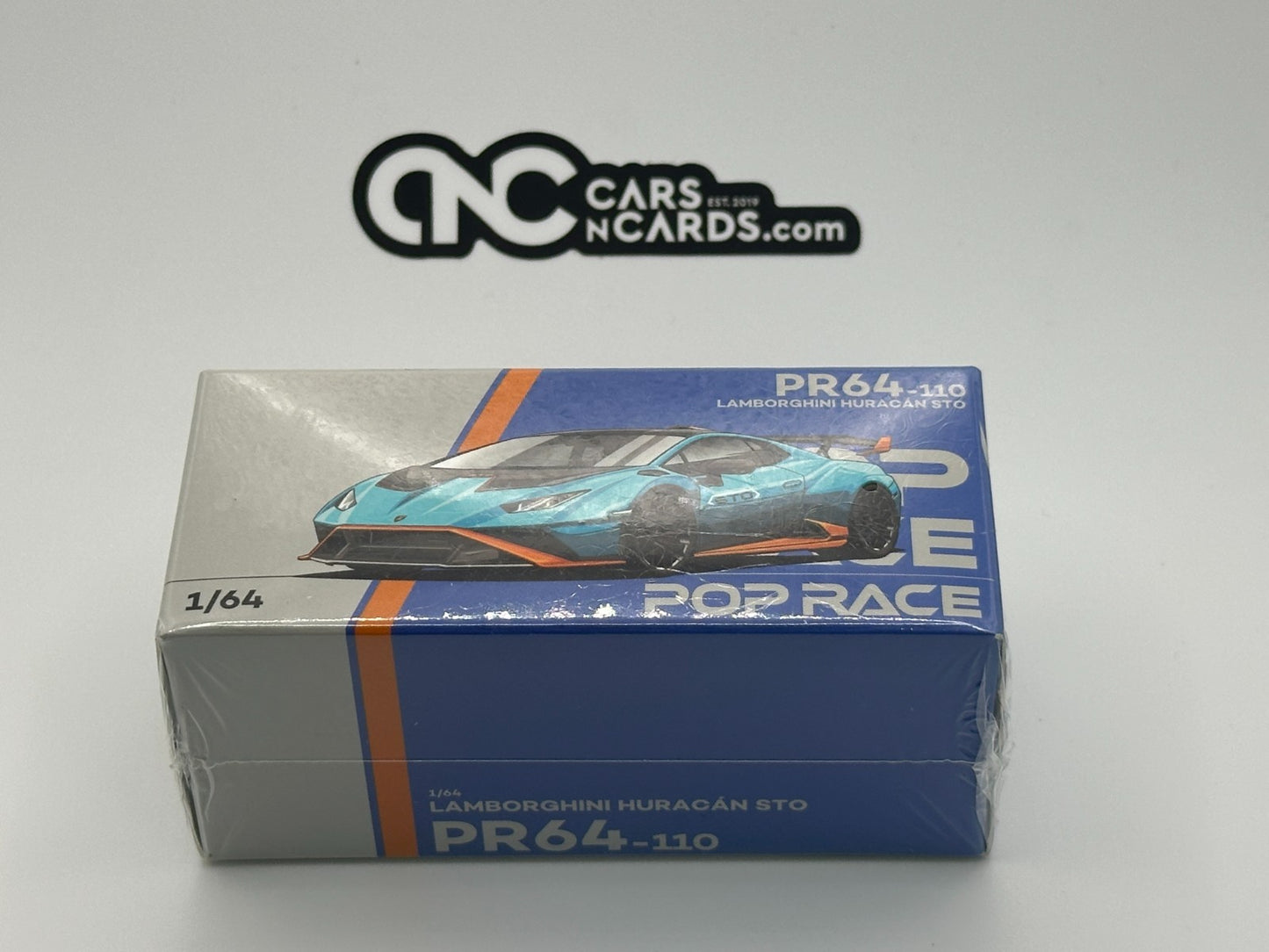 POPRACE 1:64 LAMBORGHINI HURACÁN STO BLU LAUFEY/ARANCIO XANTO PR640110