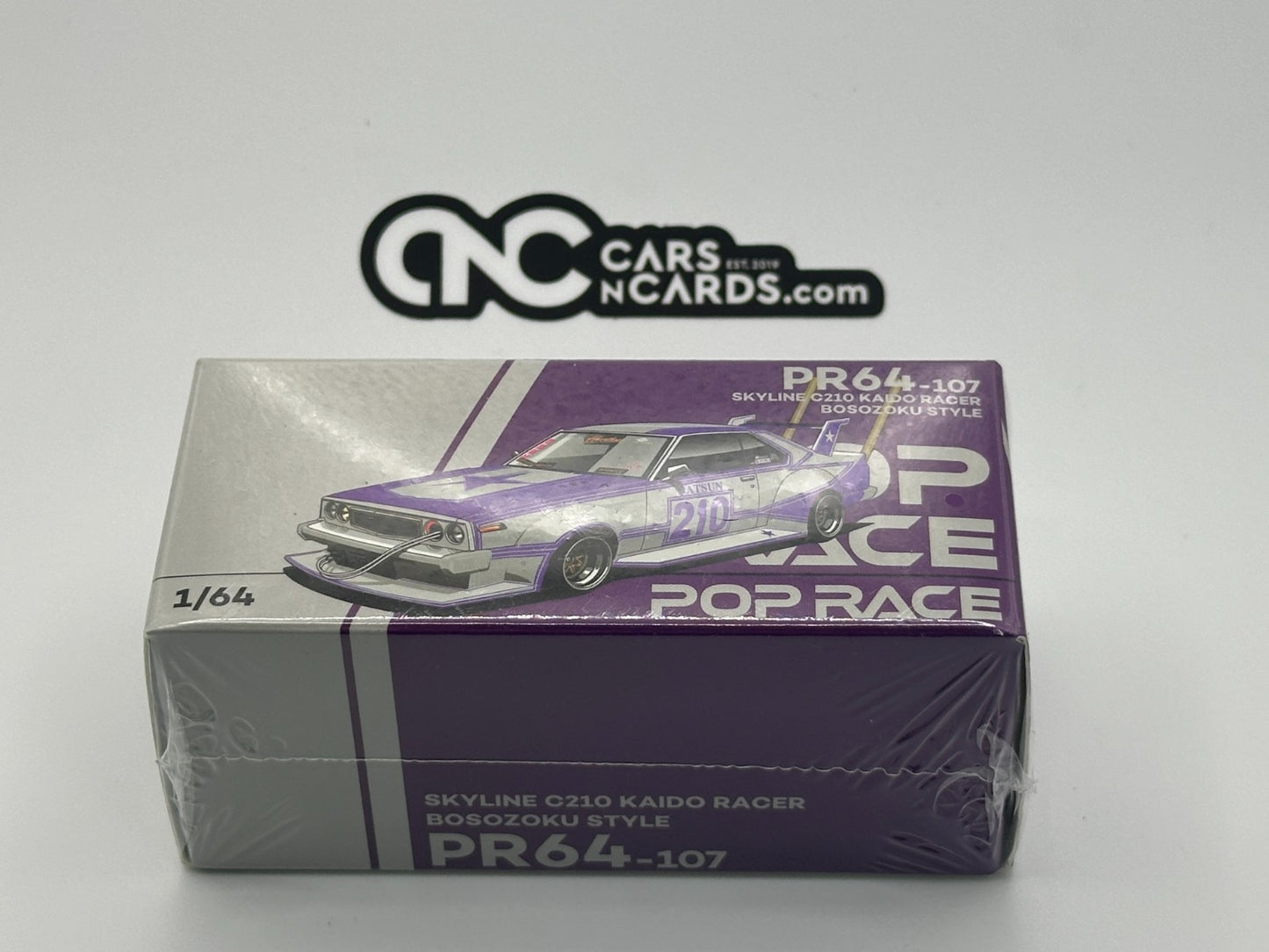 POPRACE 1:64 SKYLINE C210 KAIDO RACER (BOSOZOKU STYLE) PURPLE CHROME/SILVER PR64
