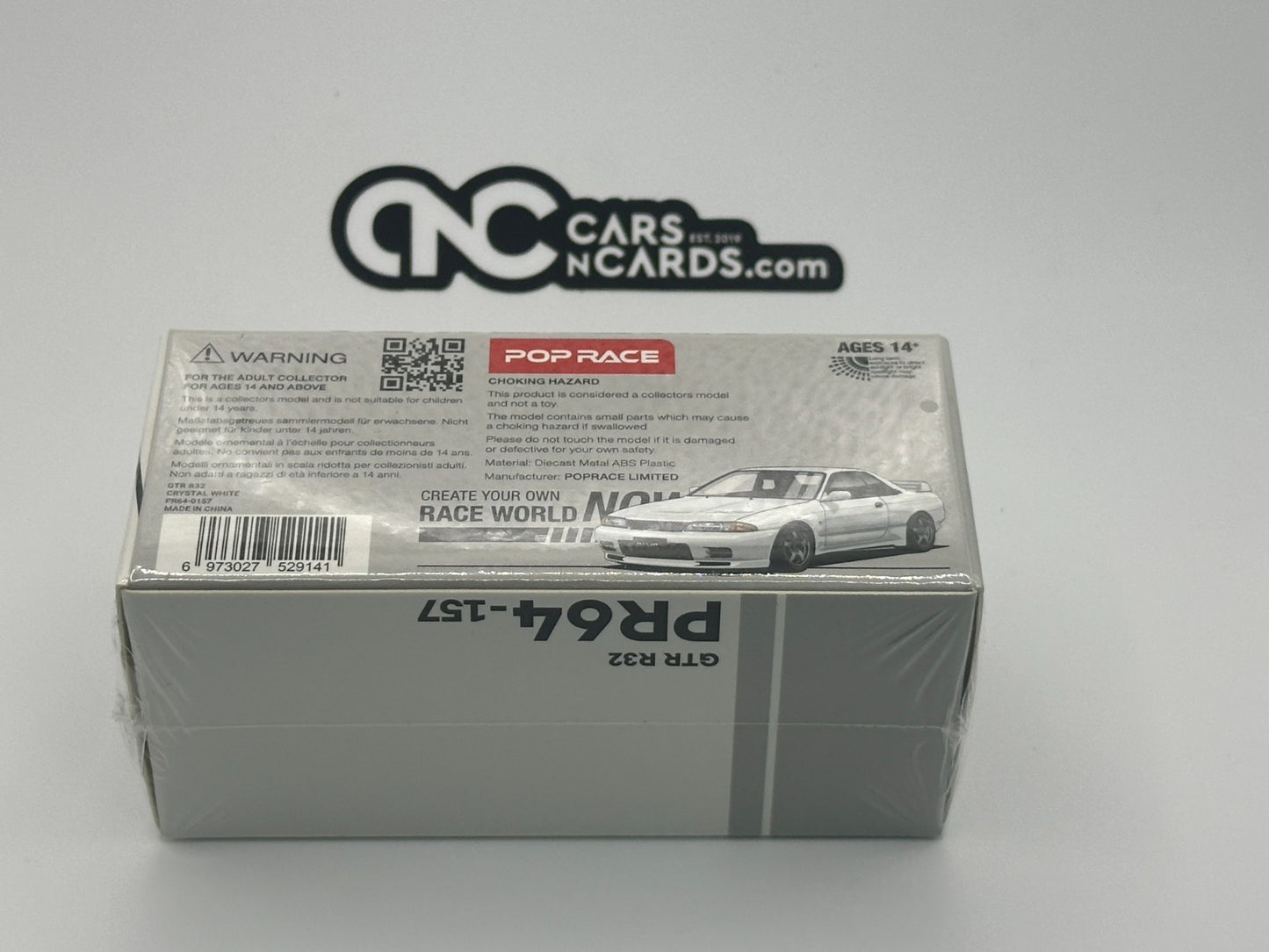 POPRACE 1:64 NISSAN SKYLINE GT-R R32 - CRYSTAL WHITE PR640157