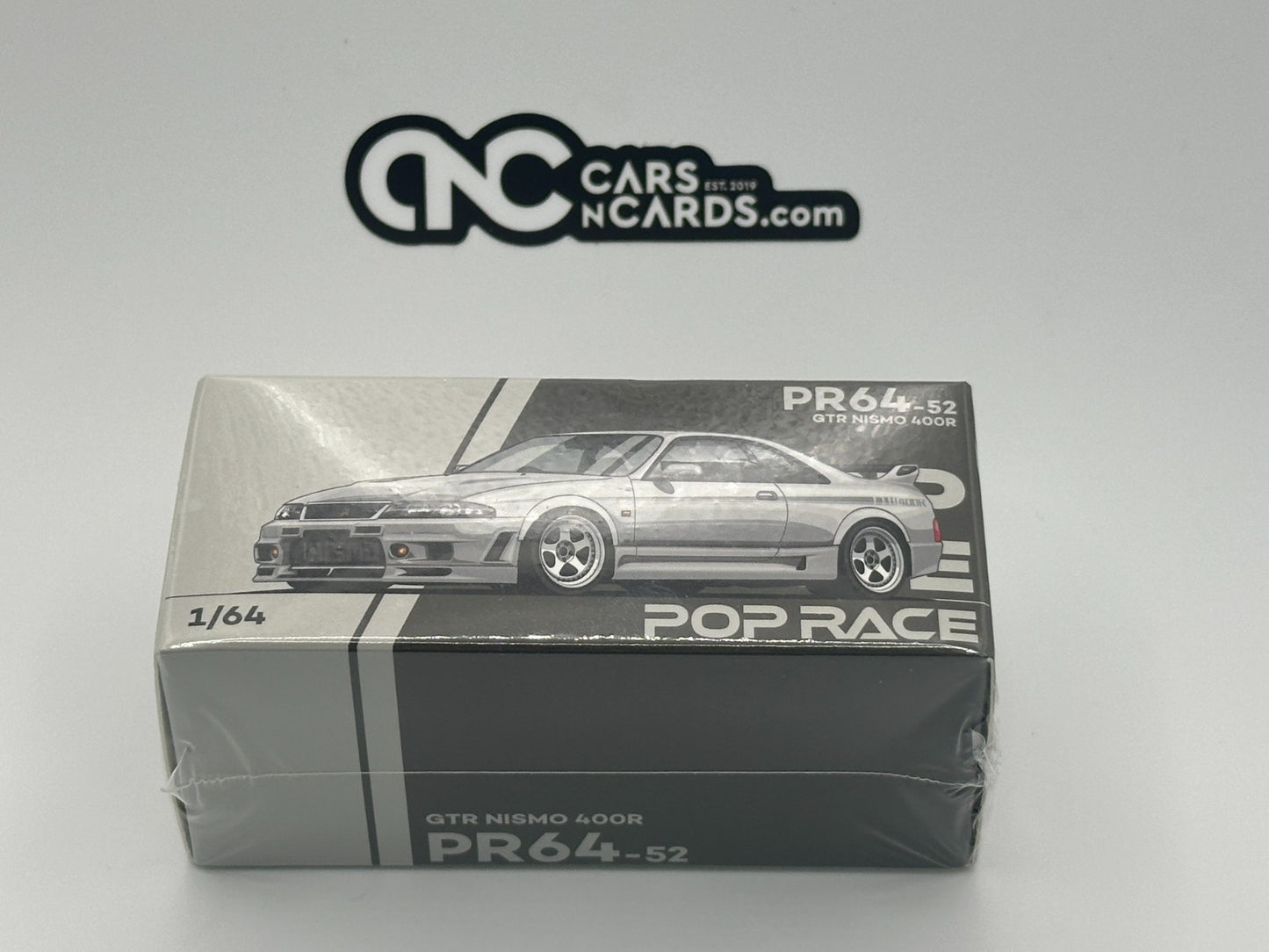 POPRACE 1:64 NISSAN GT-R R33 NISMO 400R - WHITE PR640052