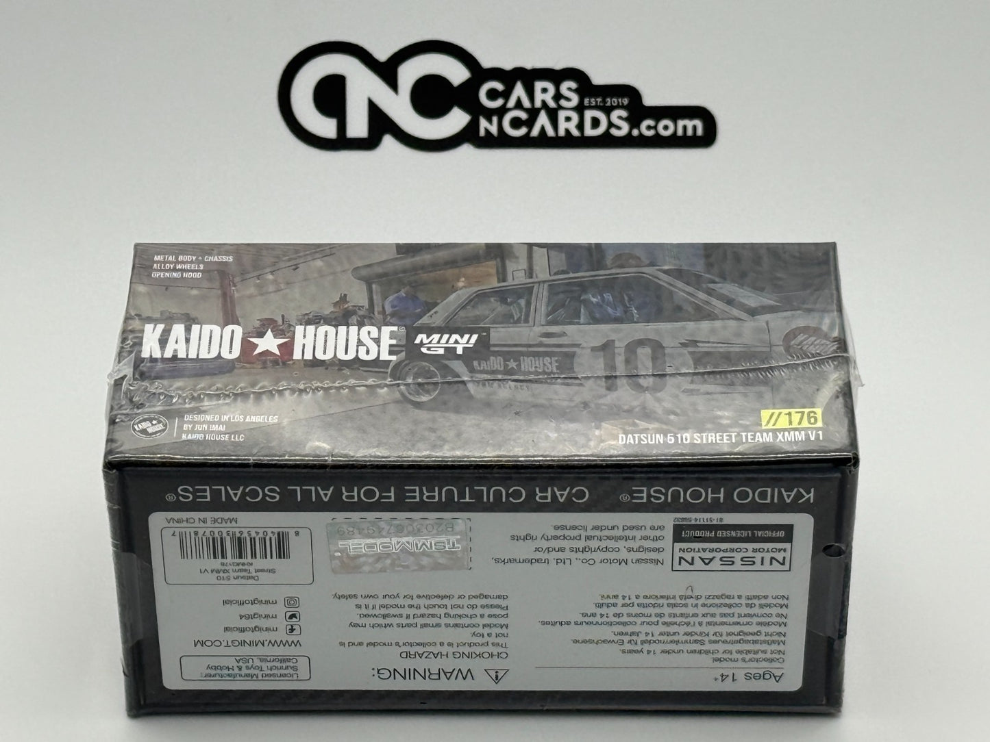 Kaido House x Mini GT 1:64 Datsun 510 Street Team XMM V1- White Sealed
