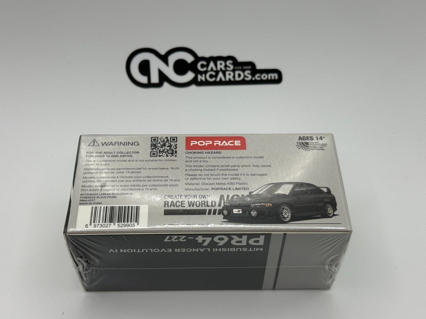 POPRACE 1:64 MITSUBISHI LANCER EVOLUTION IV - PYRENEES BLACK PEARL PR640227