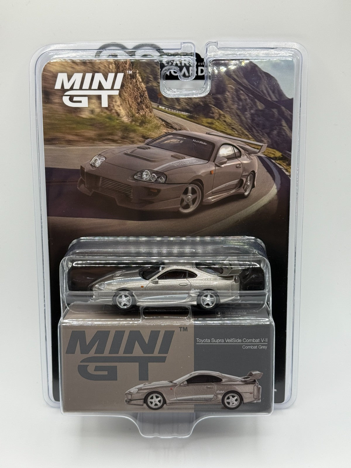 Mini GT 1:64 Toyota Supra VeilSide Combat V-II – Combat Grey Sealed Blister