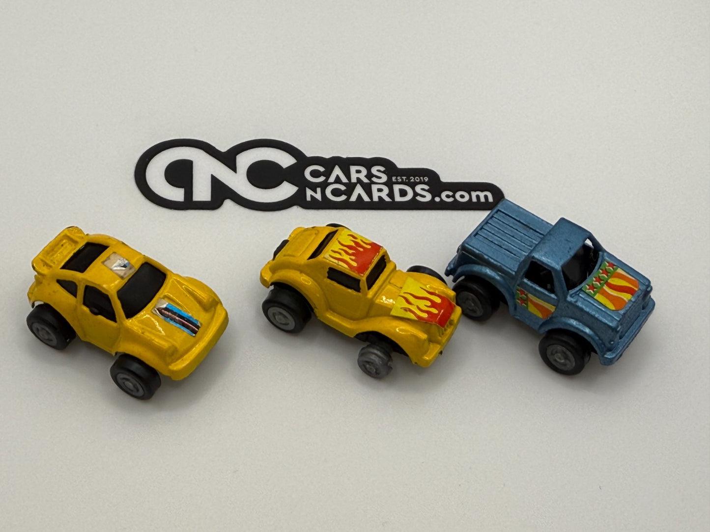 1989 Soma Micro Racer Carry Case With 3 Micro Cars (One Rubber Wheel Missing)