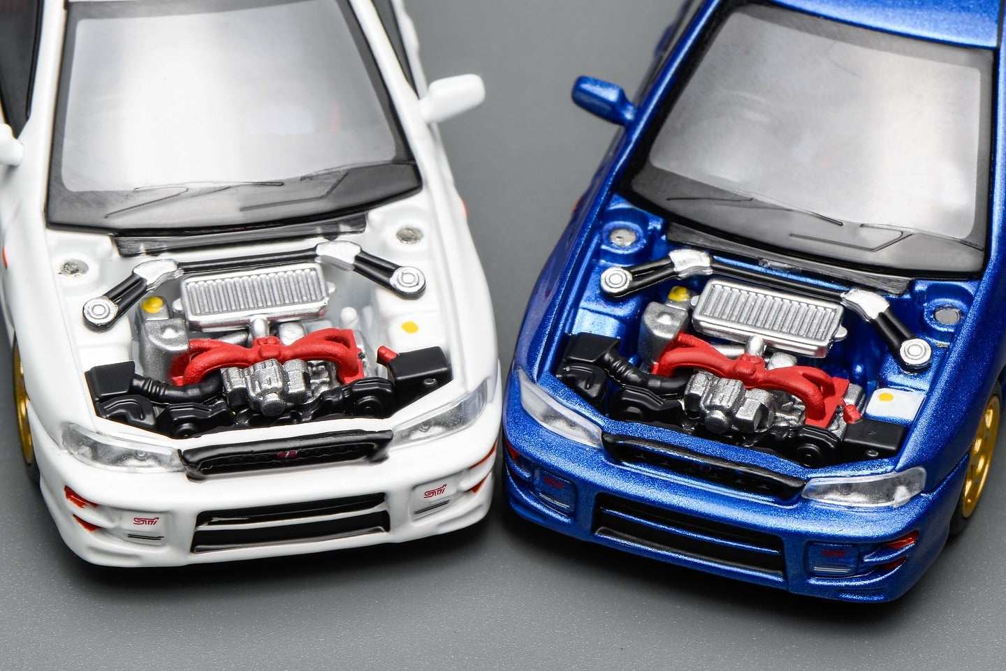 (PRE-ORDER) Motorhelix 1:64 Subaru Impreza Wagon WRX STi Version VI (GC8) Pure White M67102
