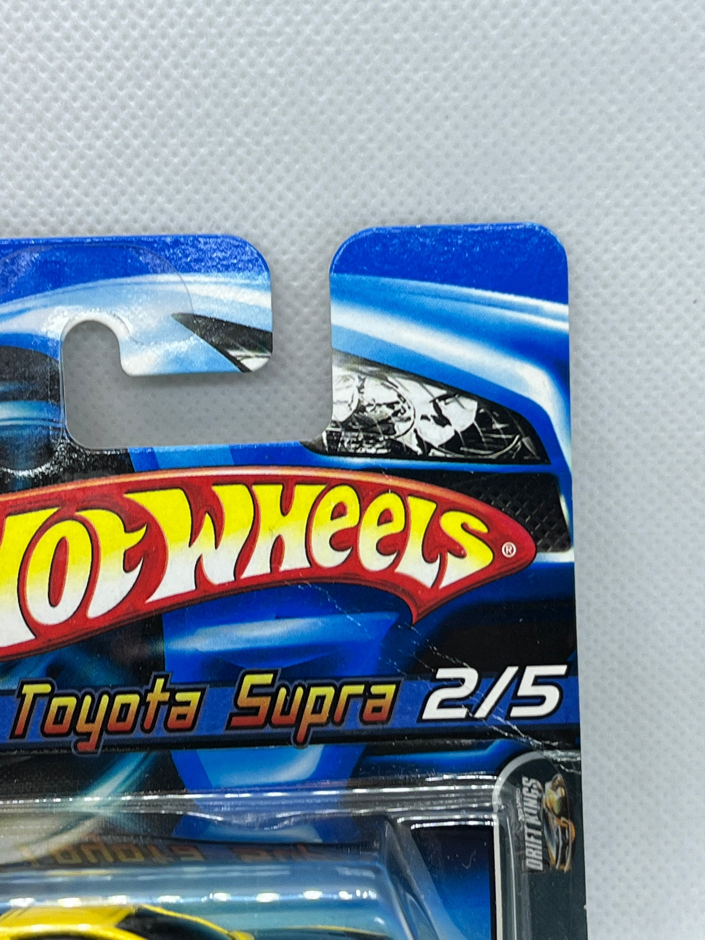 2006 Hot Wheels Tooned Toyota Supra Yellow Short Card NIP With Protector