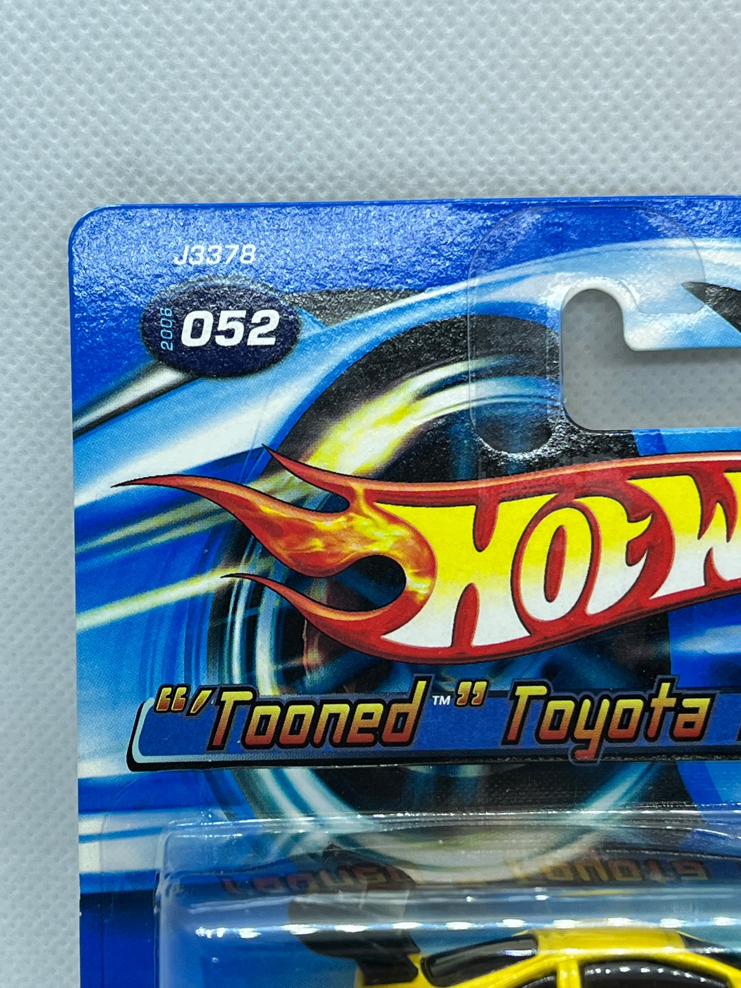 2006 Hot Wheels Tooned Toyota Supra Yellow Short Card NIP With Protector