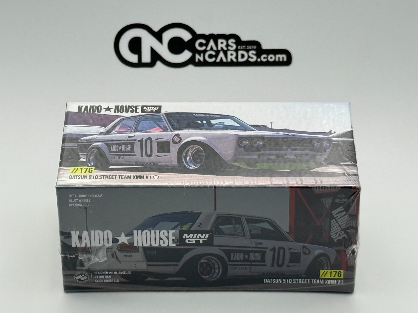 Kaido House x Mini GT 1:64 Datsun 510 Street Team XMM V1- White Sealed