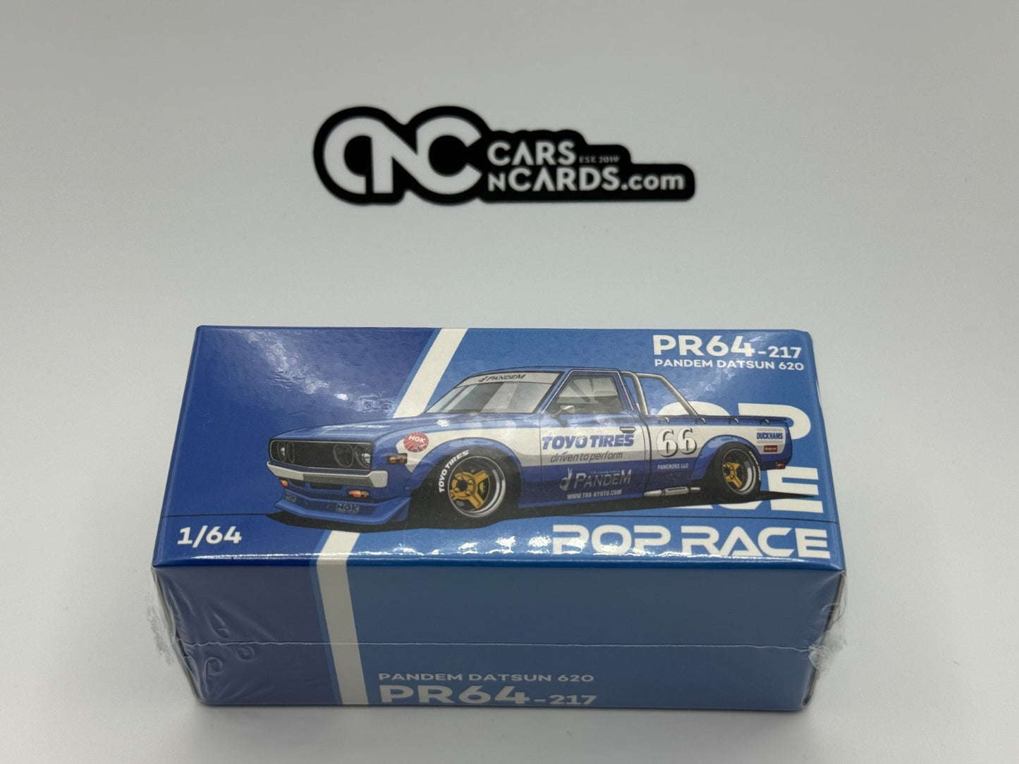 POPRACE 1:64 PANDEM DATSUN 620 BLUE PR640217