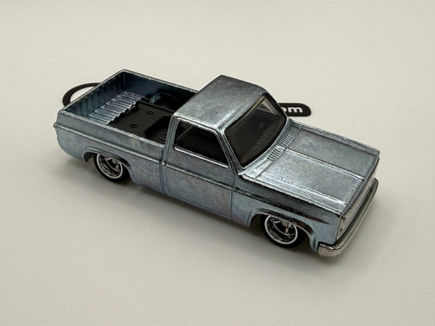 2025 Hot Wheels ‘83 Chevy Silverado ZAMAC With Real Riders Loose
