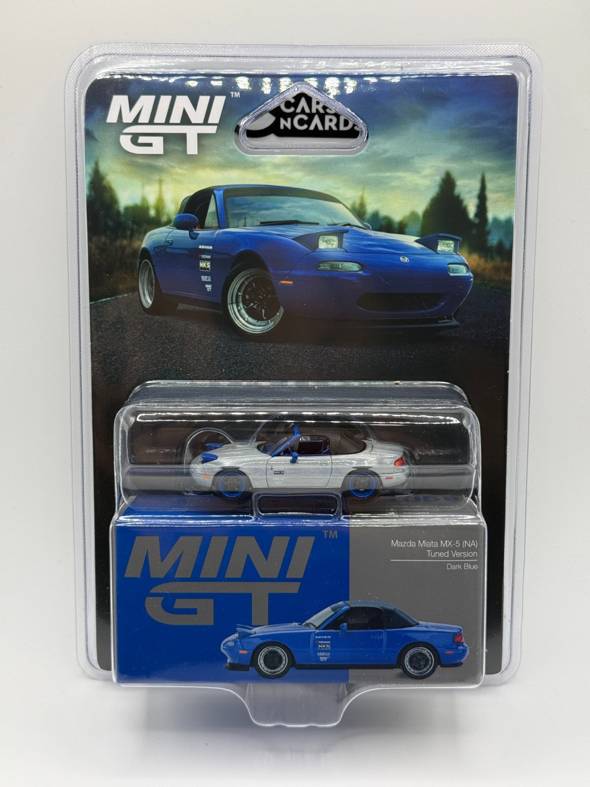 Mini GT 1:64 Mazda Miata MX-5 (NA) Tuned Version – Dark Blue Raw Chase