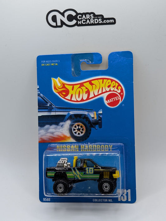 1991 Hot Wheels Nissan Hardbody Black Green & Blue Collector #131 (Card Crease)