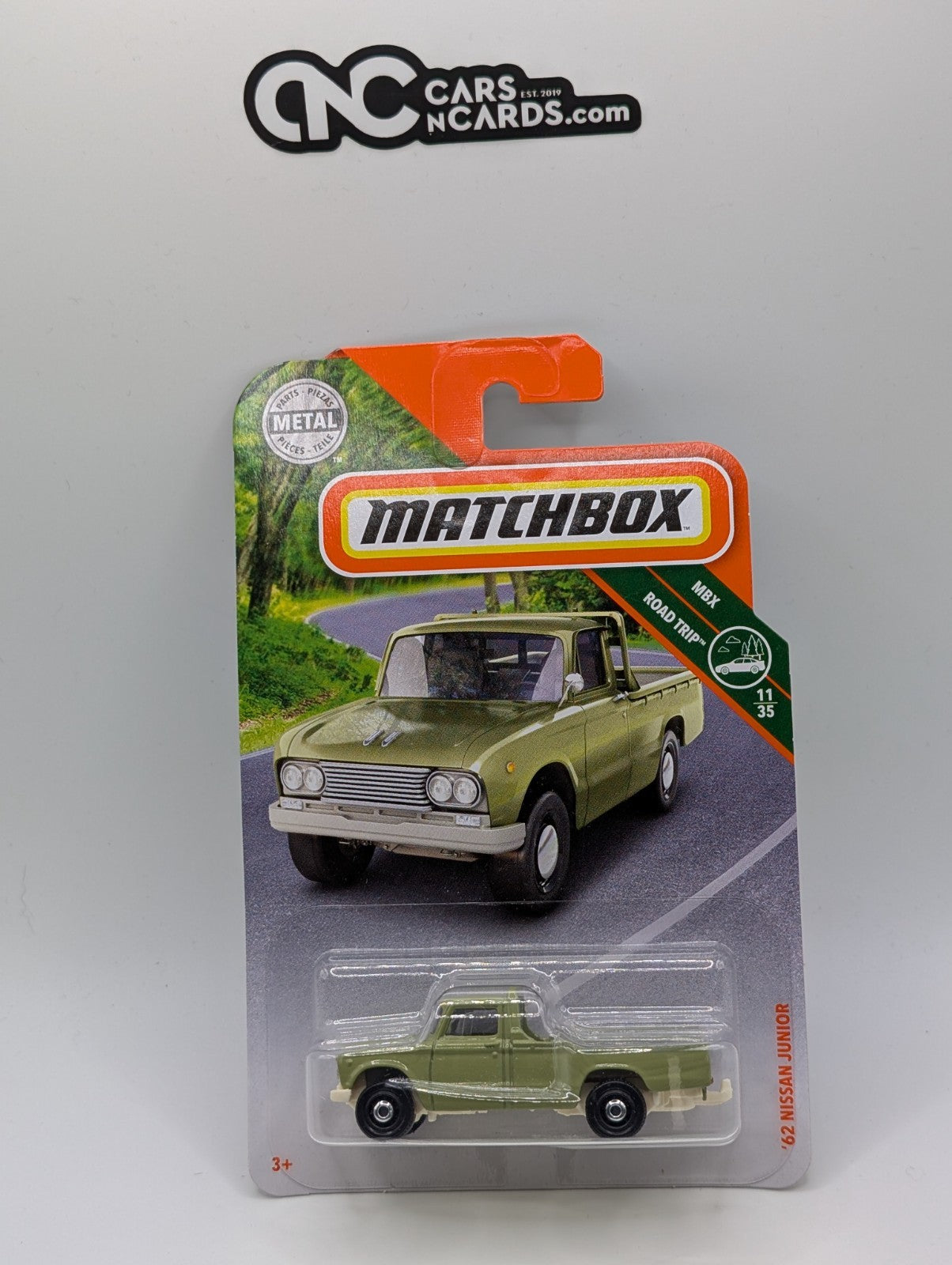 Matchbox MBX Road Trip 11/35 '62 Nissan Junior Green (Card Crease)