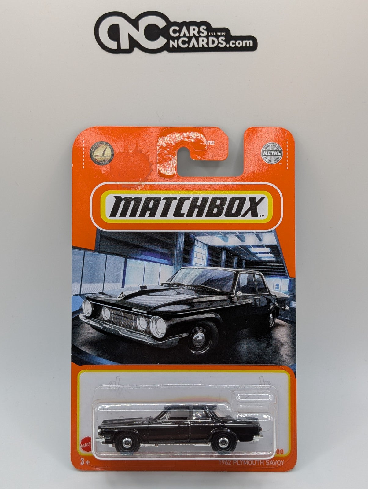 Matchbox 1962 Plymouth Savoy Black 52/100 (Card Damage)
