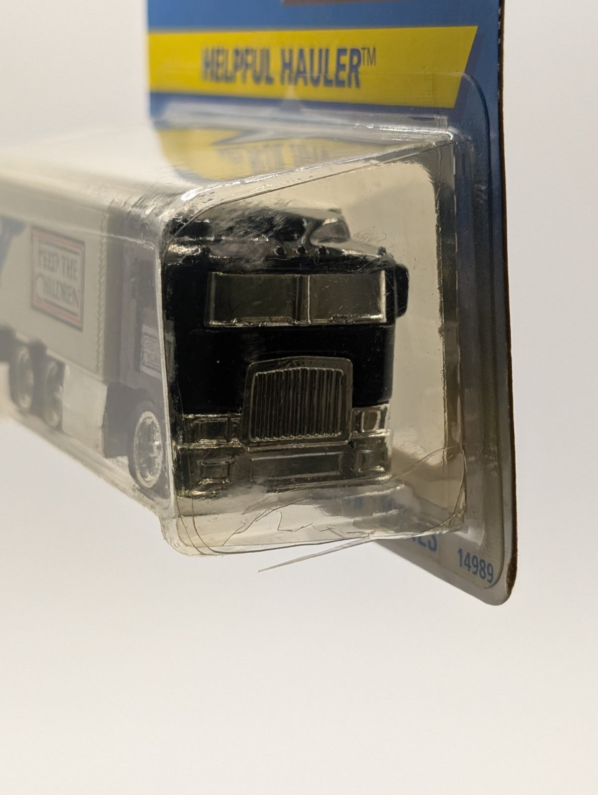 1996 Hot Wheels Helpful Hiway Hauler Feed The Children (Cracked Blister)