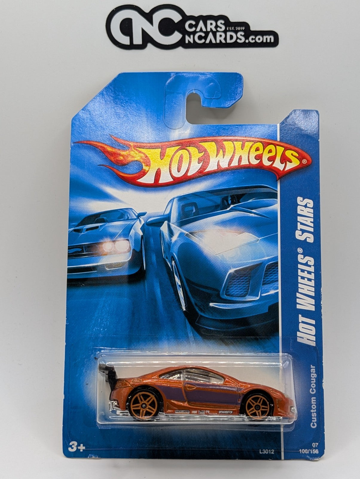 2007 Hot Wheels All Stars Custom Cougar Orange 106/156 (Card Damage)