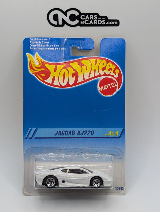 1995 Hot Wheels Pearl Driver 4/4 Jaguar XJ220 White 13283 (Card Damage)