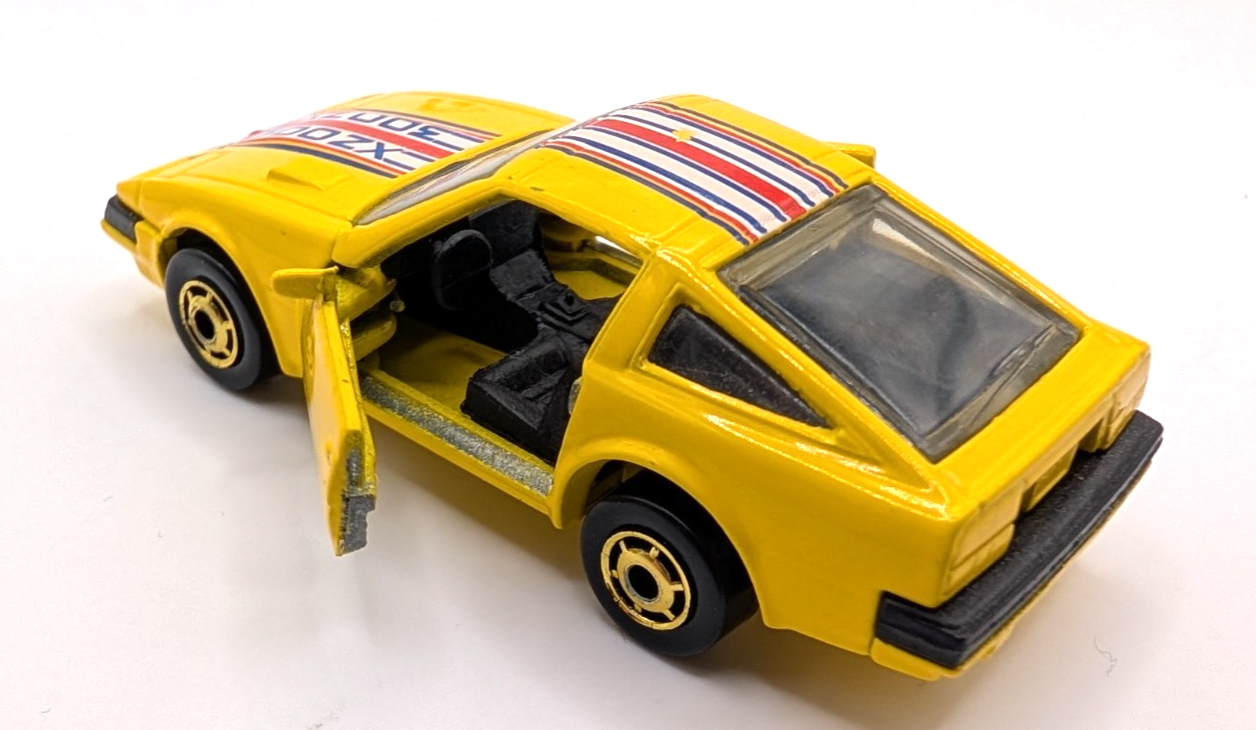 1987 Hot Wheels Nissan 300ZX Yellow Opening Doors LOOSE