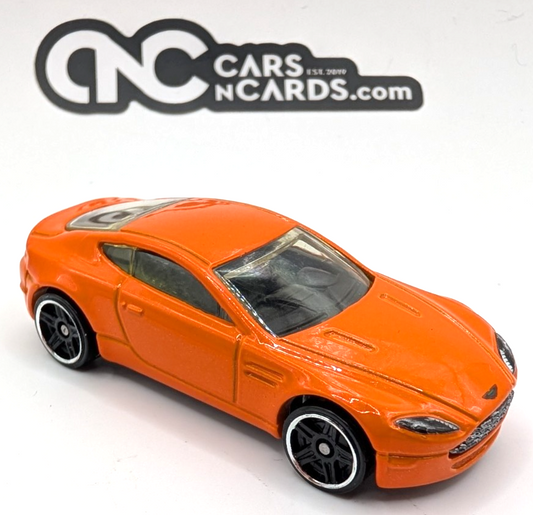 2010 Hot Wheels Mystery Cars Aston Martin V8 Vantage Orange LOOSE