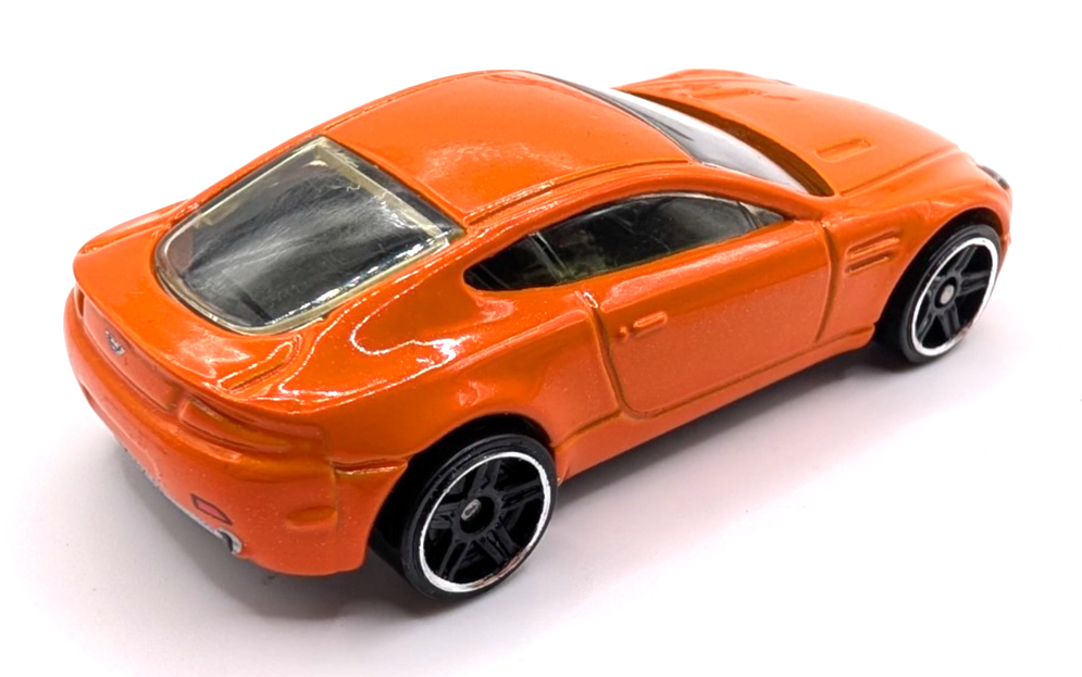 2010 Hot Wheels Mystery Cars Aston Martin V8 Vantage Orange LOOSE