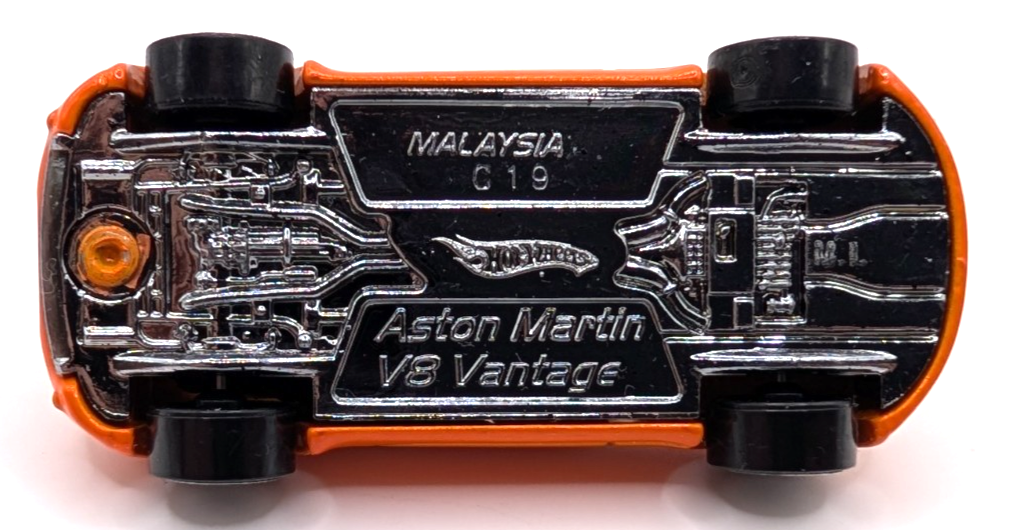 2010 Hot Wheels Mystery Cars Aston Martin V8 Vantage Orange LOOSE