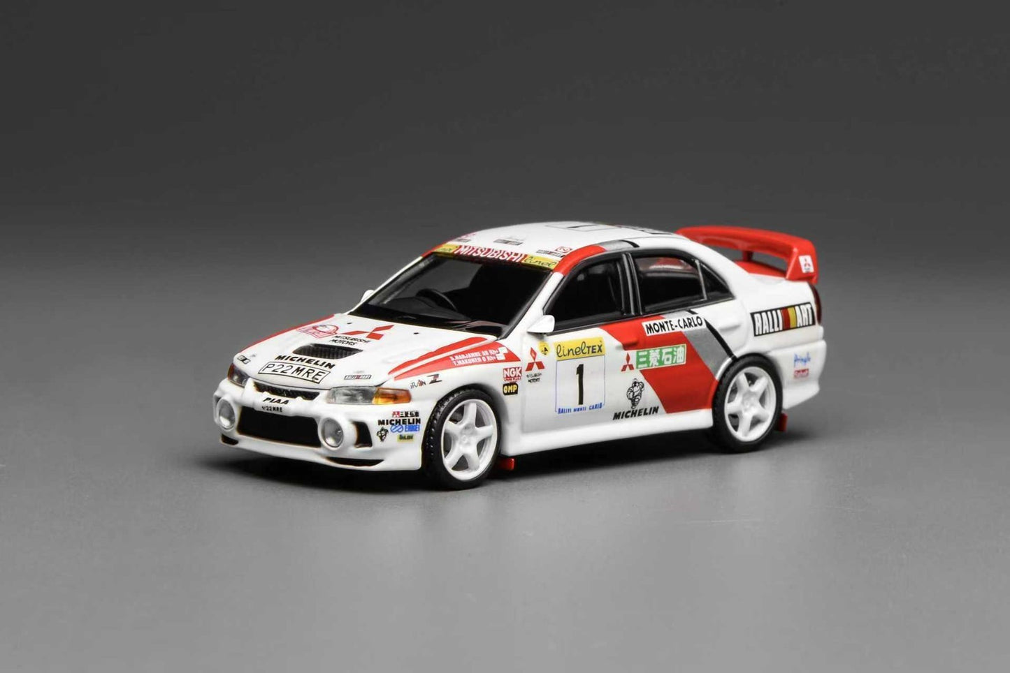 Motorhelix 1:64 Mitsubishi Lancer Evolution IV GSR MONTE CARLO LIVERY M64010
