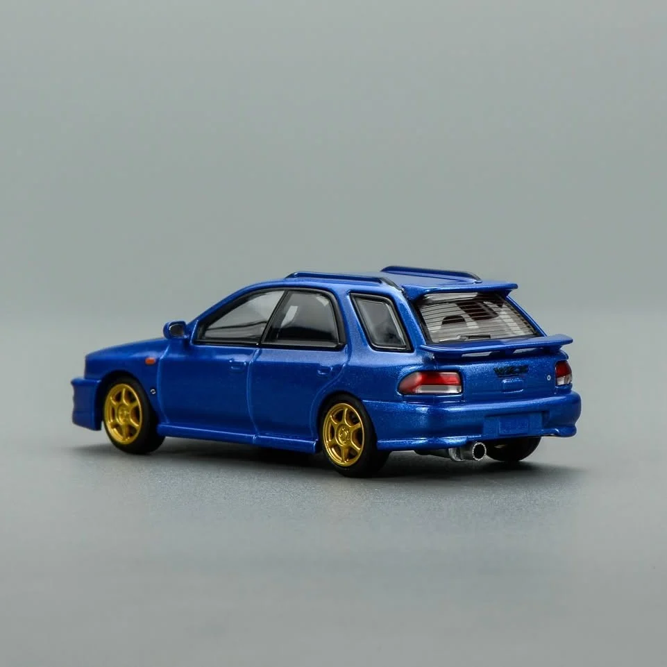 MOTORHELIX 1:64 SUBARU Impreza Wagon WRX STi Ver. VI Rally Blue Carbon M67108