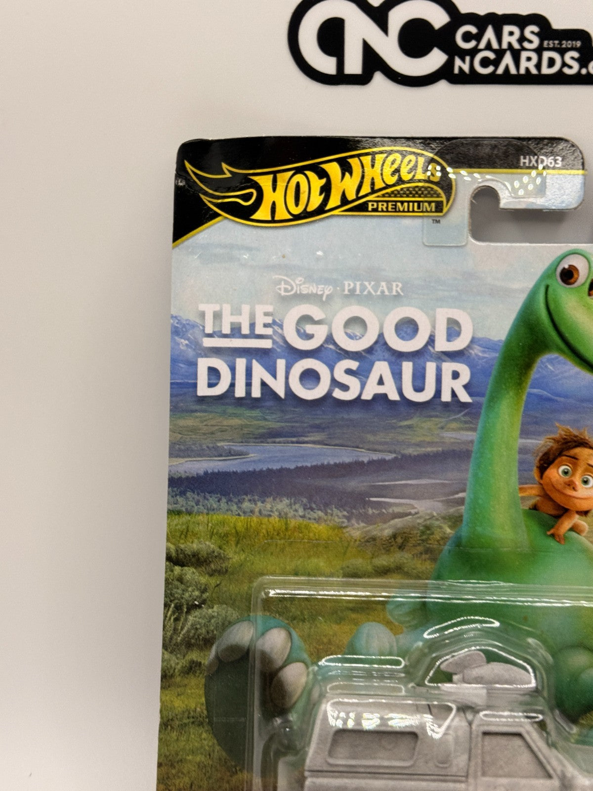 2026 Hot Wheels Premium Disney Pixar The Good Dinosaur Pizza Planet Card Damage