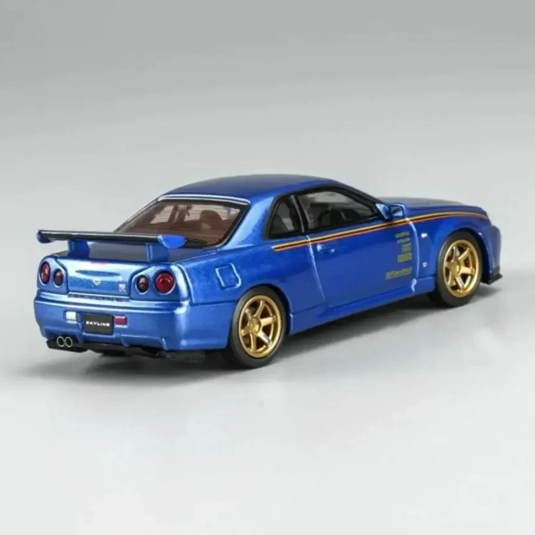 MOTORHELIX 1:64 Nissan Skyline GT‑R (R34) Customized Bayside Blue Hong Kong Toy