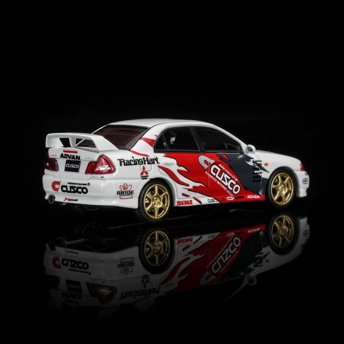 Motorhelix 1:64 Mitsubishi Lancer Evolution IV GSR White CUSCO Racing Livery M64