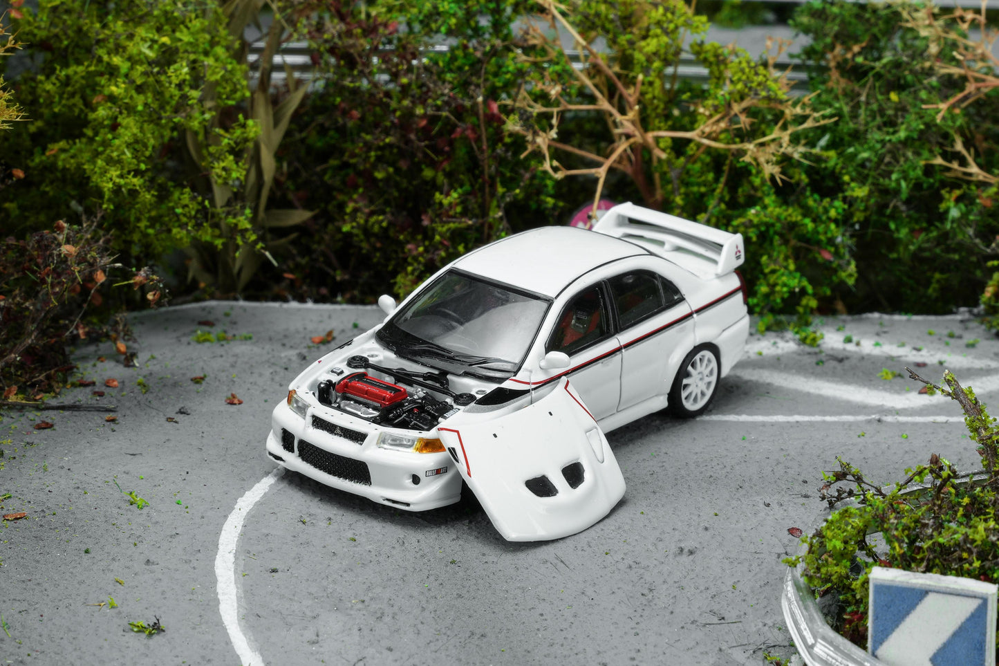(PRE-ORDER) Motorhelix 1:64 Mitsubishi Lancer Evolution VI GSR T.M.E Scottish White with livery M64305