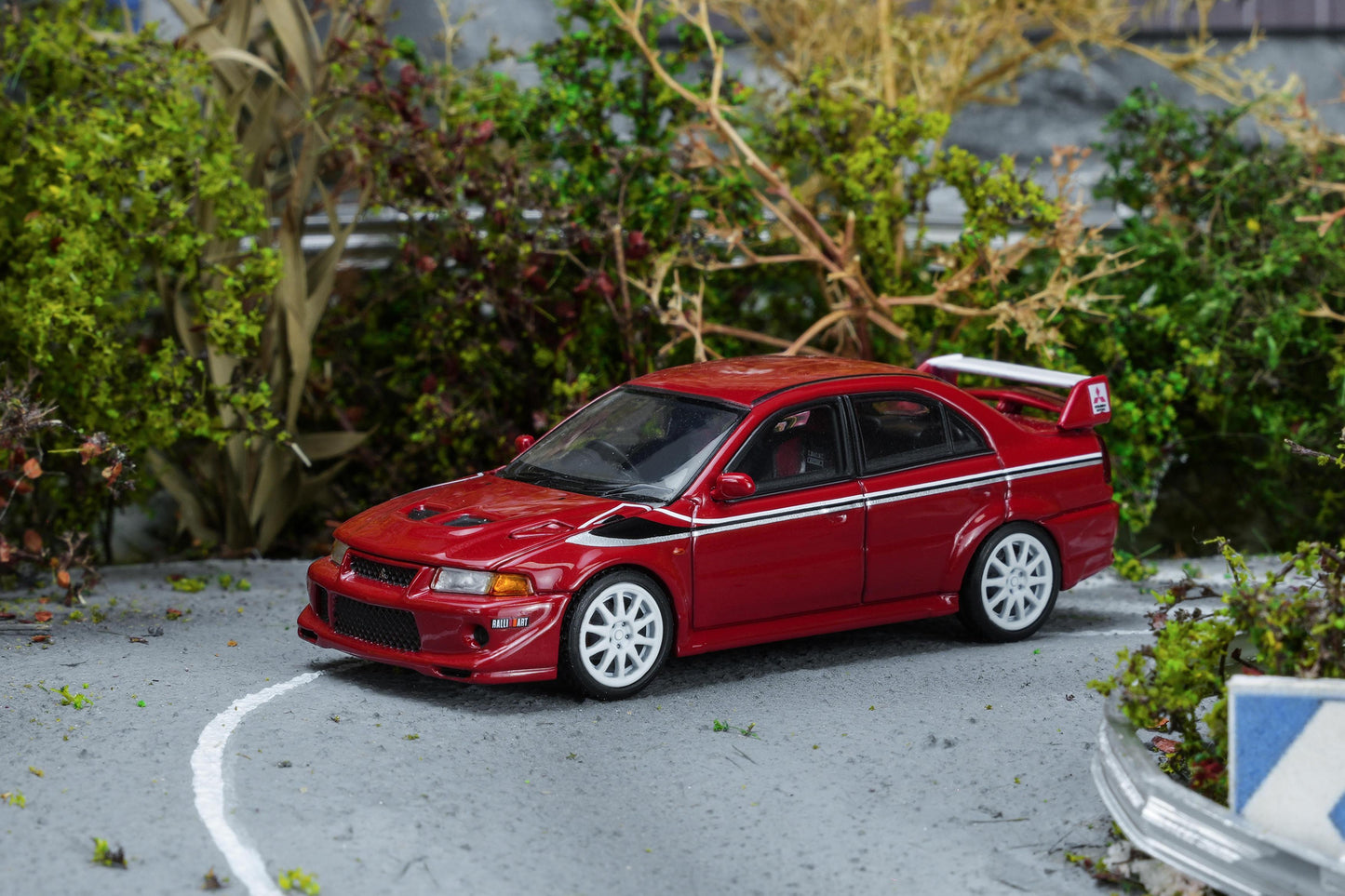 (PRE-ORDER) Motorhelix 1:64 Mitsubishi Lancer Evolution VI GSR T.M.E Passion Red with livery M64301