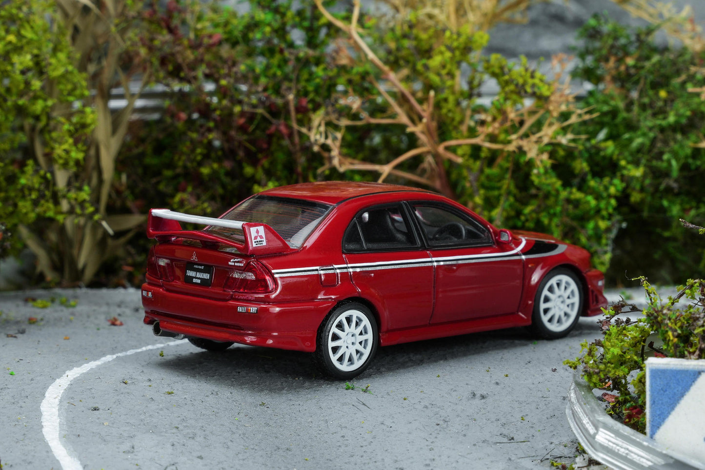 (PRE-ORDER) Motorhelix 1:64 Mitsubishi Lancer Evolution VI GSR T.M.E Passion Red with livery M64301