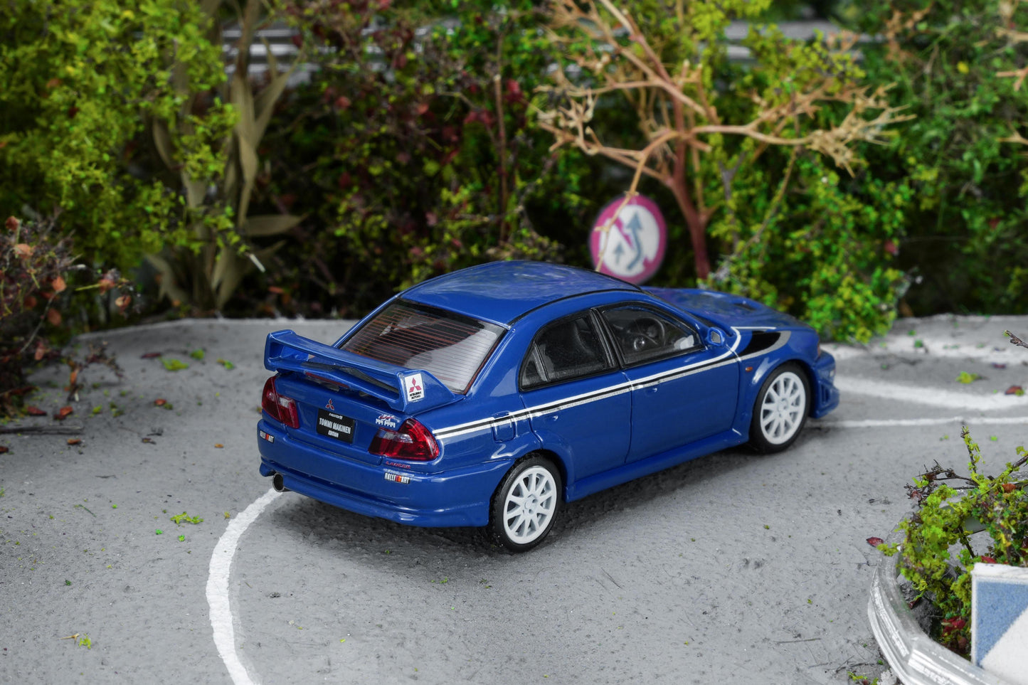(PRE-ORDER) Motorhelix 1:64 Mitsubishi Lancer Evolution VI GSR T.M.E Ice Blue with livery M64302