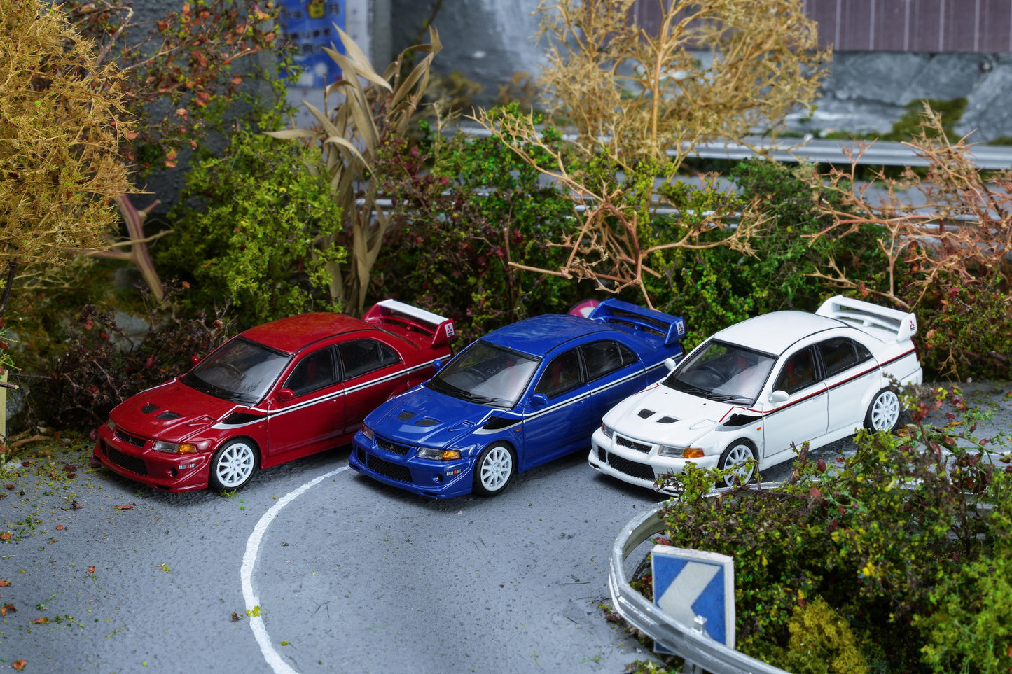 (PRE-ORDER) Motorhelix 1:64 Mitsubishi Lancer Evolution VI GSR T.M.E Scottish White with livery M64305