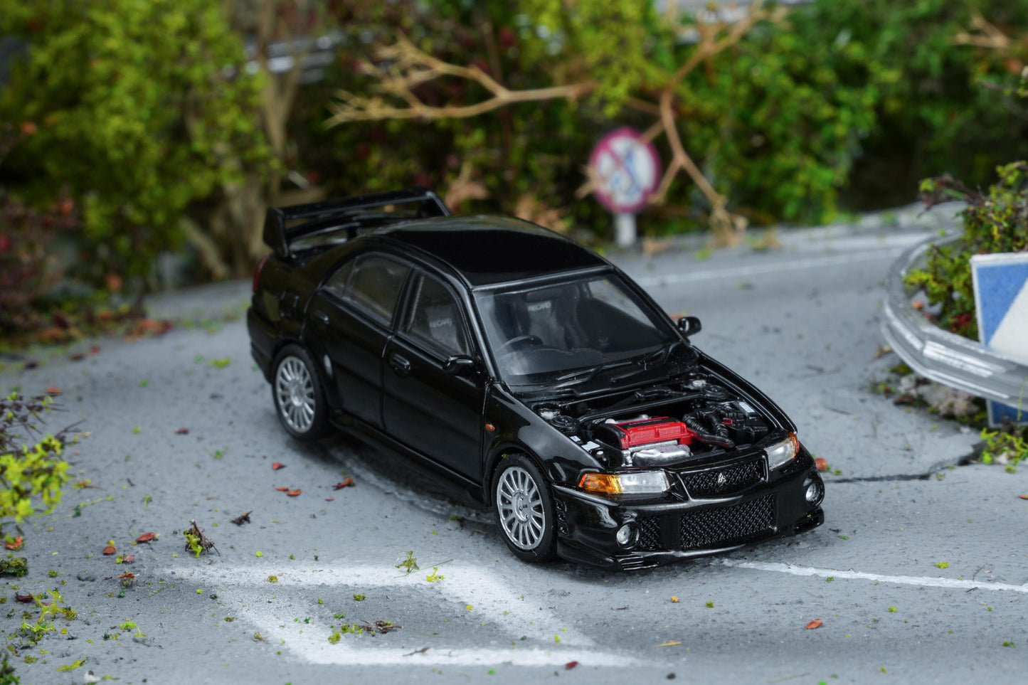 (PRE-ORDER) Motorhelix 1:64 Mitsubishi Lancer Evolution VI GSR Pyrenean Pearl Black M64201