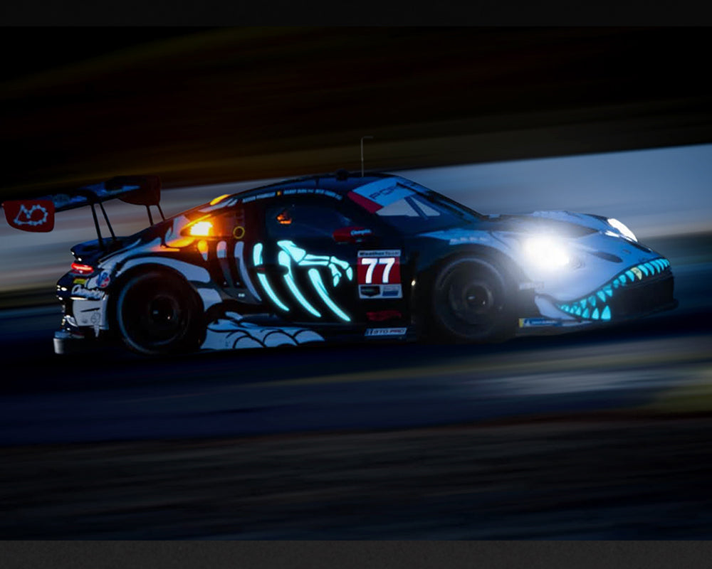 (PRE-ORDER) Mini GT - Porsche 911 GT3 R (992) #77 AO Racing “Skeleton Rexy” 2026 IMSA Petit Le Mans – (Glow in the Dark) – Limited Edition MGT01436-BL