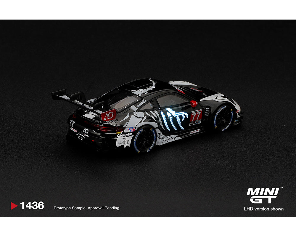 (PRE-ORDER) Mini GT - Porsche 911 GT3 R (992) #77 AO Racing “Skeleton Rexy” 2026 IMSA Petit Le Mans – (Glow in the Dark) – Limited Edition MGT01436-BL