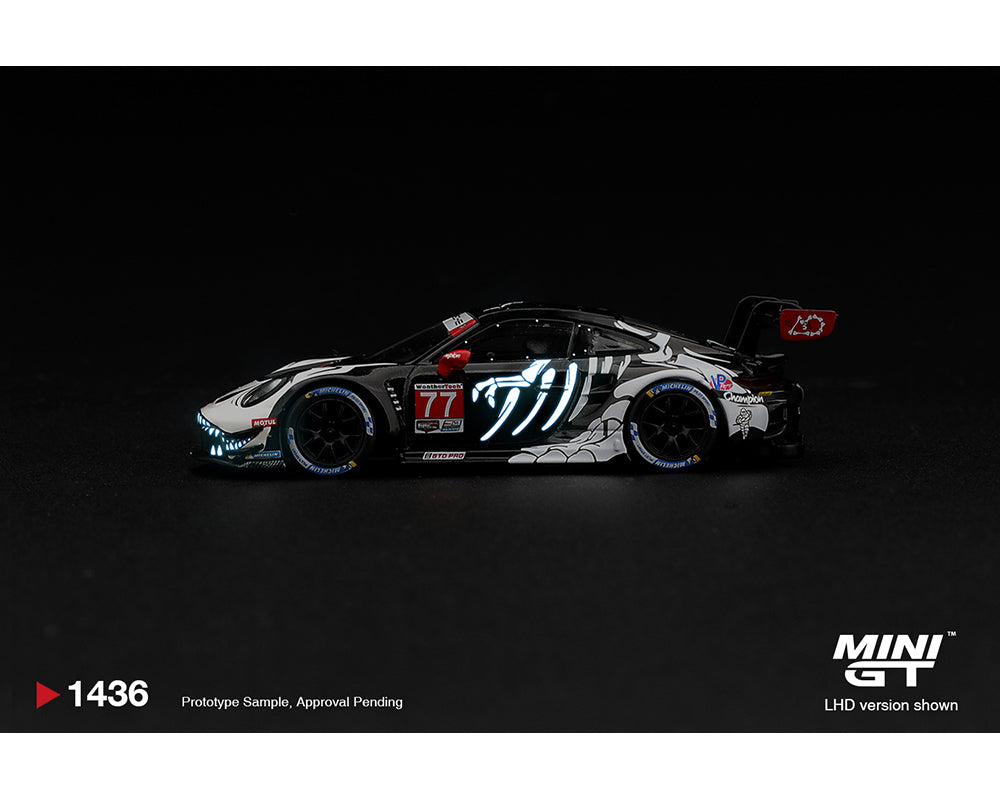 (PRE-ORDER) Mini GT - Porsche 911 GT3 R (992) #77 AO Racing “Skeleton Rexy” 2026 IMSA Petit Le Mans – (Glow in the Dark) – Limited Edition MGT01436-BL